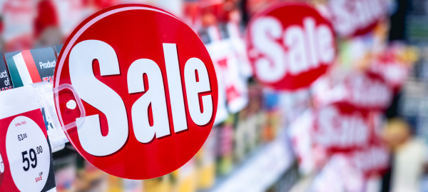 sale signage on shelves